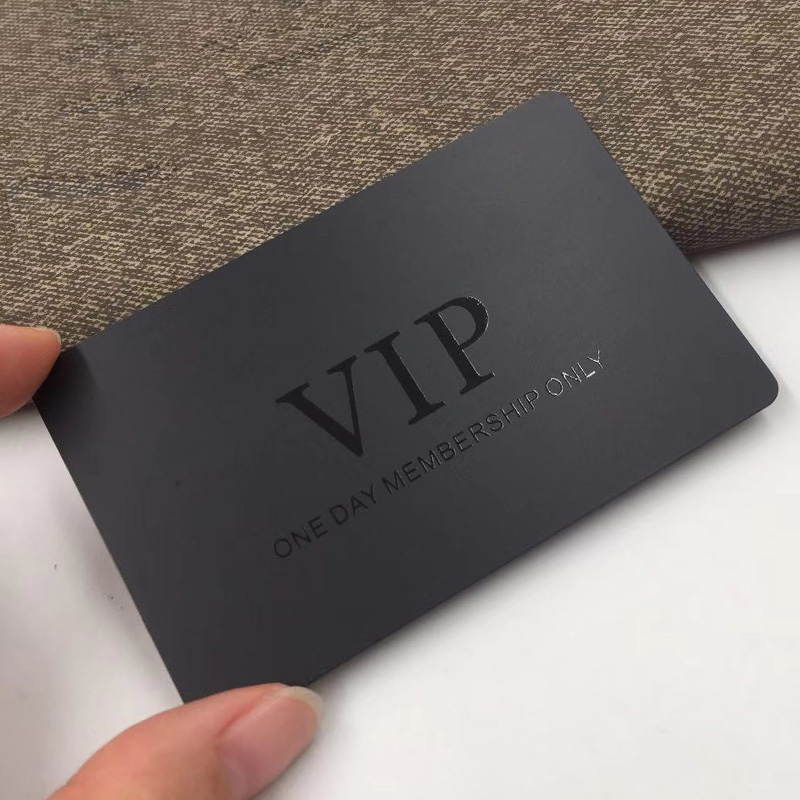 Black metal card with printed UV